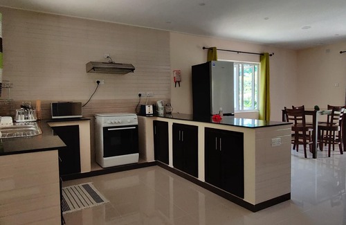 Anse aux Pins Apartment | Peace in Paradise with mountain views and 5 minutes walk to the beach