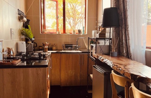 Lusaka Central Apartment | Peaceful and tranquil garden cottage in the heart of ibex hill