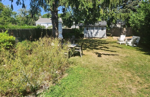 Greenport Cottage | Peaceful, clean cottage, 10 min walk to town. Monthly rates. Fenced backyard