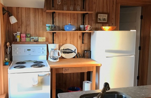 Cushing Cottage | Peaceful, cozy one-bedroom waterfront carriage house steps from our private cove