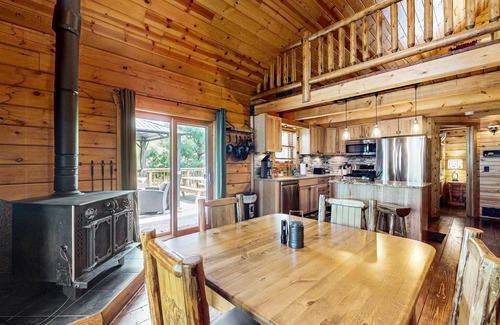 New Lisbon Cabin | Peaceful log cabin with patio, gas grill, fire pit & WIFI