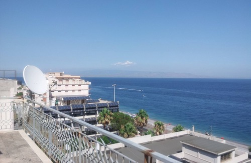 Santa Teresa di Riva Apartment | PENTHOUSE-SUITE WITH PRIVATE SOLARIUM NEAR TAORMINA