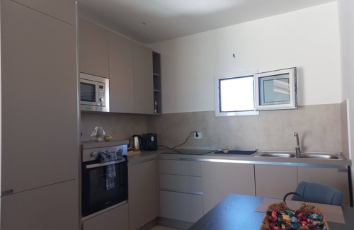 Eastern Sicily House | Penthouse with terrace, sea front overlooking Ortigia and its monuments.