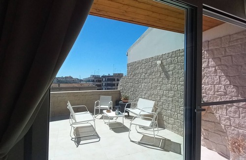 Eastern Sicily House | Penthouse with terrace, sea front overlooking Ortigia and its monuments.