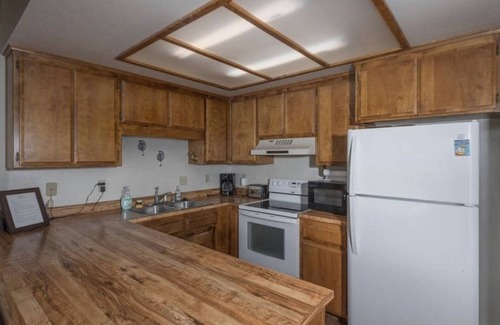 Peninsula Village Condo | Perfect location on the water in the cove!