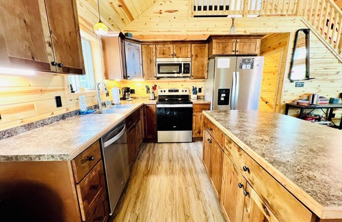 Stone Lake Cabin | Pet-Friendly Lakeside Lodge with Kayaks and Canoe!