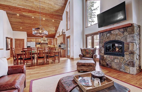 Fairways House | Pet Friendly- Pine Needle Lodge, a 4BR, 4.5BA retreat with hot tub, views, and sleeps 10.