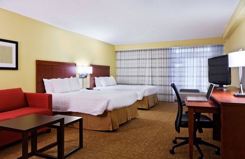 Brookhollow Hotel | Pet-Friendly Retreat Perfect for Family Fun in Houston | Close to Art Car Museum