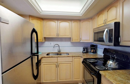 Sunset Beach Condo | Picture Perfect Views From Every Window! Corner Unit on Sunset Beach in Treasure Island.