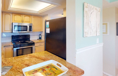 Sunset Beach Condo | Picture Perfect Views From Every Window! Corner Unit on Sunset Beach in Treasure Island.