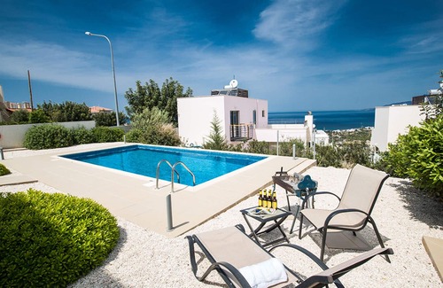 Lakatamia Villa | Picture Relaxing Beside Your Private Pool in Your Villa Reading Your Favourite Book