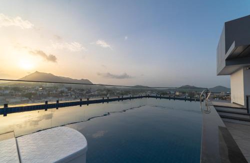 Shavri Colony Hotel | PINNACLE Udaipur - Boutique Rooftop Pool Hotel, Near the Lakes