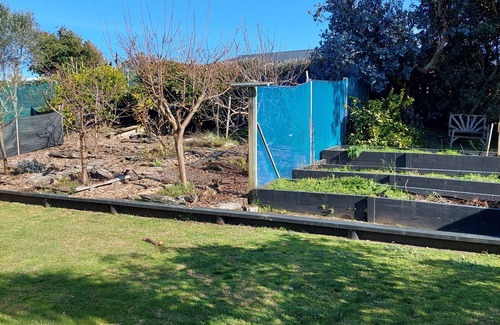 Waitarere Beach House | Pipers Place - 3 bedrooms, Sleeps 6, fully fenced home. Relax in the garden