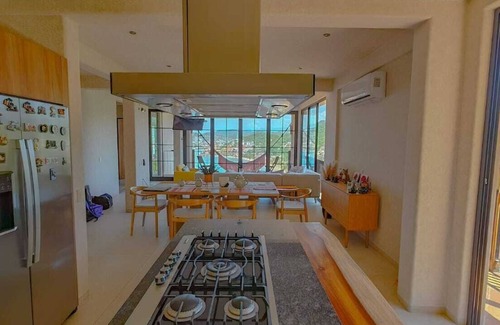 Cerro del Vigia Apartment | PISCIS CONDOnDawn overlooking the most beautiful bay in Mexico.