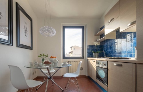 Oltrarno Apartment | Pitti Luxury Terrace in Florence, a terrace overlooking Florence by Mmega