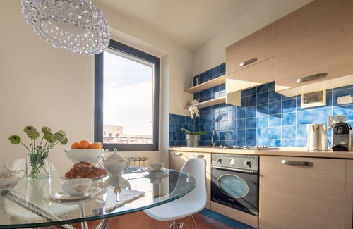 Oltrarno Apartment | Pitti Luxury Terrace in Florence, a terrace overlooking Florence by Mmega