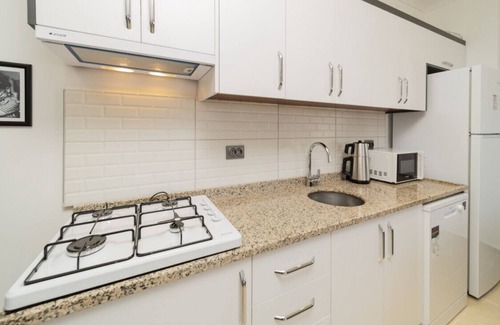 Lara Apartment | Pleasant Apartment with Balcony in Aksu