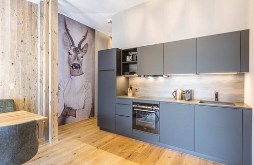 Fuegen Apartment | Pleasant apartment with shared pool