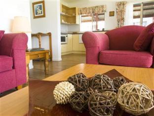 Burnt Pine Resort | Poinciana Cottages