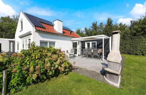 Ouddorp House | Poldersbos 3 - Ouddorp "BarLeDunes" - met jacuzzi en sauna