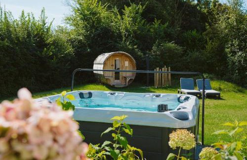 Ouddorp House | Poldersbos 3 - Ouddorp "BarLeDunes" - met jacuzzi en sauna