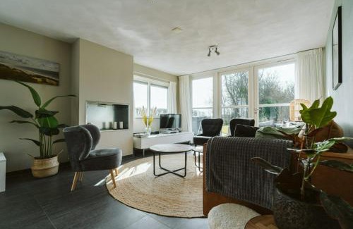 Ouddorp House | Poldersbos 3 - Ouddorp "BarLeDunes" - met jacuzzi en sauna