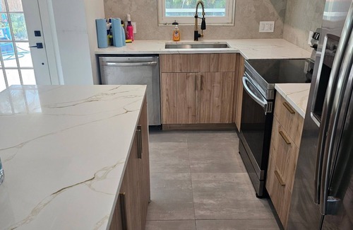 Redington Beach House | Pool Home one block from the beach with Putting Green