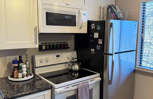 Greenwood Village Apartment | POOL, laundry in-unit, super clean, 2-bed 2-bath, unique decor & gas fireplace