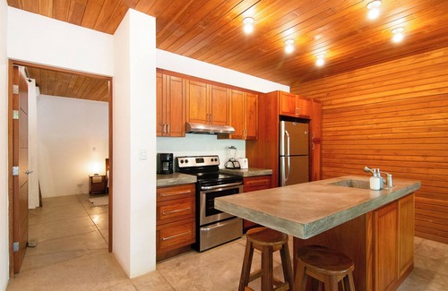Playa Guiones Apartment | Pool-Side Apartment with Jungle Views and Beach Access