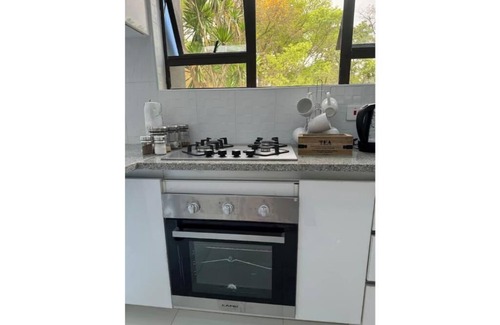 Harare Apartment | Pool-view Executive Suite