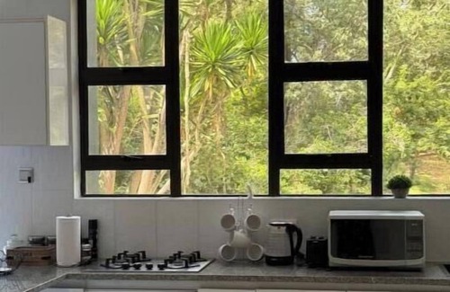 Harare Apartment | Pool-view Executive Suite