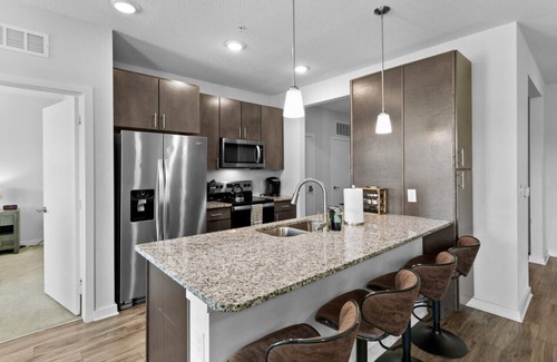 Deerwood Apartment | Poolside Bliss: Stylish 1BR Unit in Resort Complex