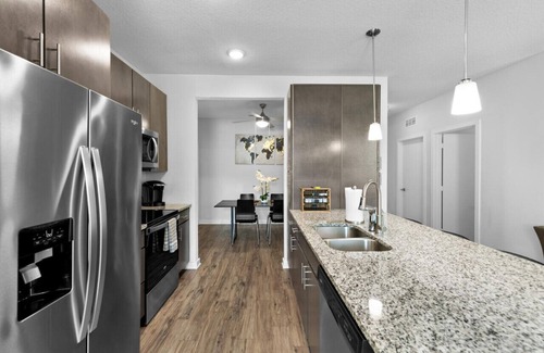 Deerwood Apartment | Poolside Bliss: Stylish 1BR Unit in Resort Complex