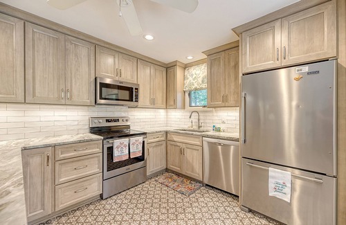 West Beach Cottage | Popular location, river view, pool access