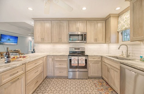 West Beach Cottage | Popular location, river view, pool access