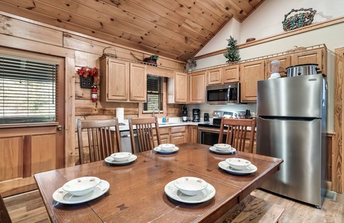 Pigeon Forge House | Porch w/swing & hot tub, sounds of stream, fireplace, pet & family friendly!