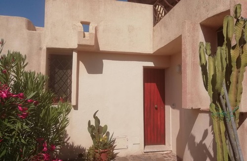 Porto Cervo Apartment | Porto Cervo, a stone's throw from the sea in a green residence with an elegant swimming pool