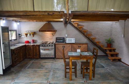 San Rafael Bed & Breakfast | POSADA ROSSINA Habitaciones con baño privado y ambientes compartidos