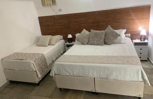 Balneario Praia do Pernambuco Hotel | Pousada Pé na Areia Guarujá