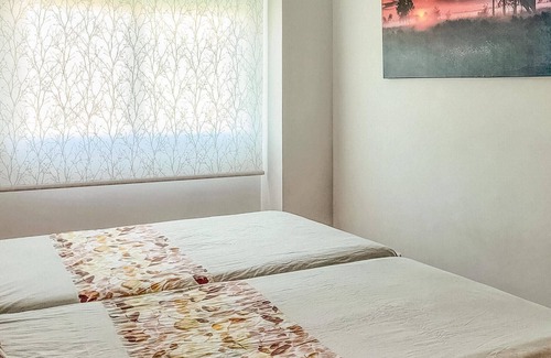 Playa de Almarda Apartment | Practical apartment on the 5th floor of an apartment complex near the sea.