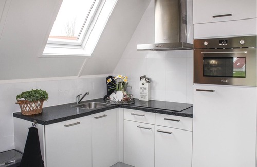 Den Oever House | Practically furnished vacation home located on the edge of a vacation park near the Ijsselmeer (3 km