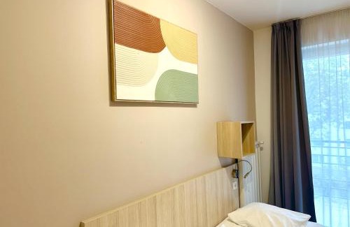 Corvin negyed Apartment | Prime Stay - Modern 2 Bedroom Family Apartment with Balcony