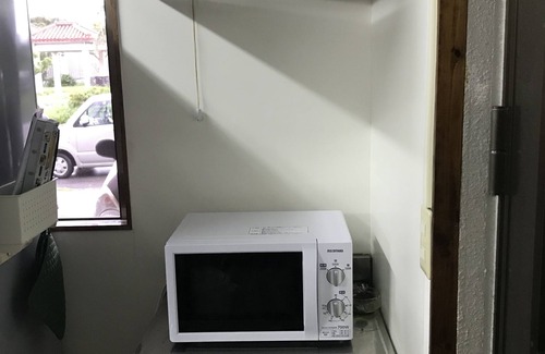 Nago House | Private accommodation for rent on the ground floor in a nice environment (kitchenette + bedroom + living room + private toilet/shower)