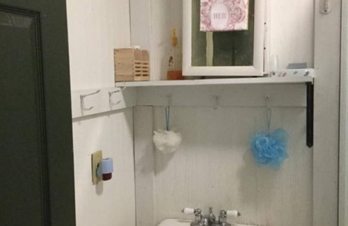 Pembine Bed & Breakfast | Private Americana-Themed Room with shared baths kitchenette