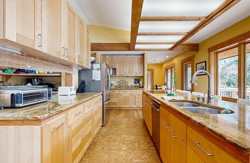 Tuckasegee House | Private eco-retreat with screened porch, play area, & wood stove