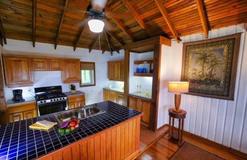 Antoneys Cay Villa | Private Hilltop Home Located Overlooking Roatans Beautiful Turquoise Reef,