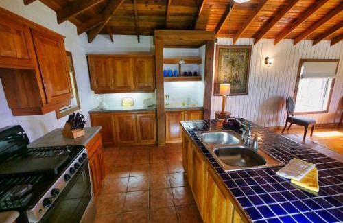 Antoneys Cay Villa | Private Hilltop Home Located Overlooking Roatans Beautiful Turquoise Reef,