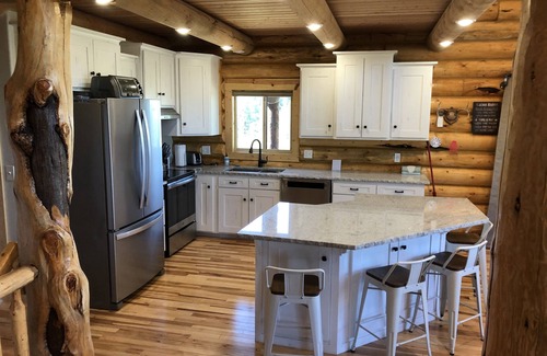 Tamarack Resort Cabin | Private Log Cabin with breathtaking views on 15 acres adjacent to forest service