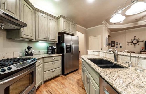 Runaway Bay House | PRIVATE, SECLUDED LAKEFRONT RETREAT WITH BOAT DOCK, LARGE PATIOS AND HOT TUB!