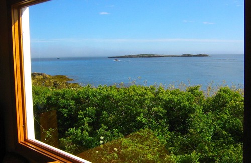 Matinicus Cottage | Private setting at ocean's edge and next to sandy beach